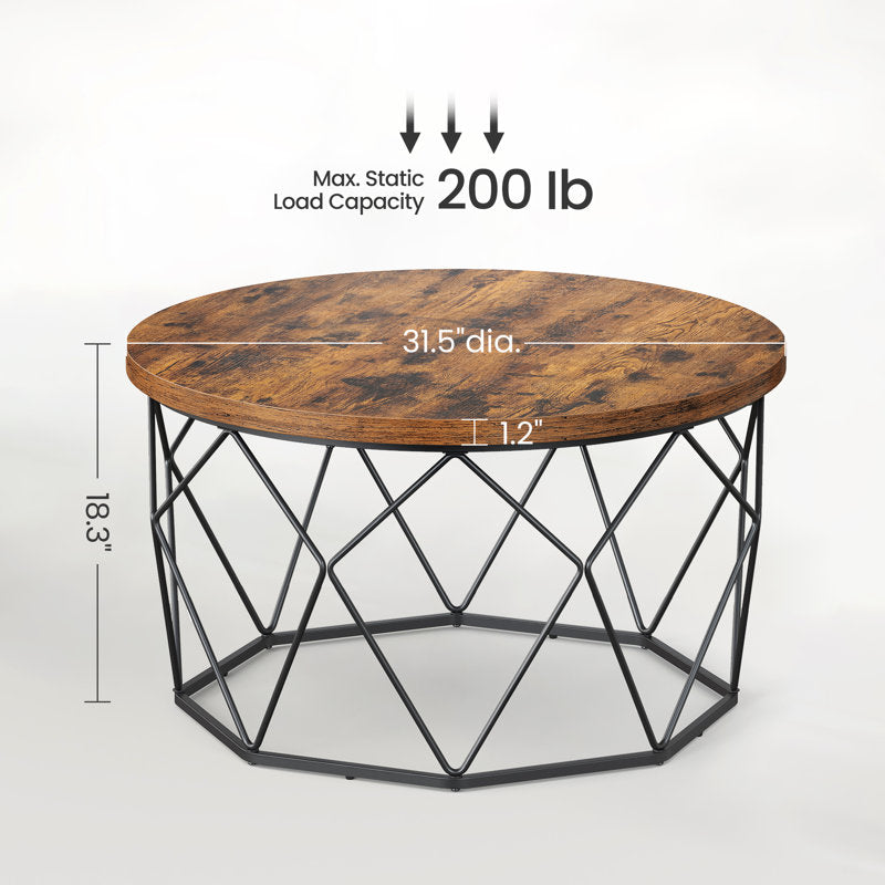 Close-up of the round coffee table top and geometric black steel base